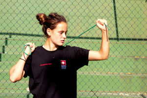 Catherine Vezey stretching at SotoTennis Academy